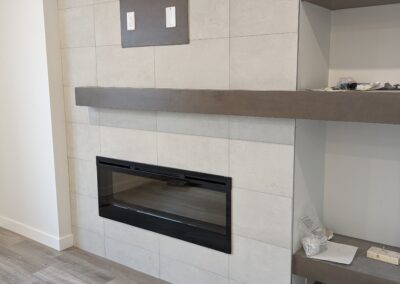 A picture of a completed fireplace tile
